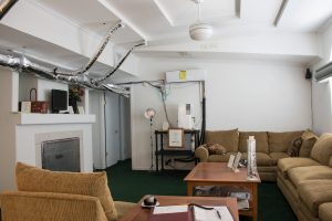 living room space in the manufactured housing lab which contains several experiments, photo