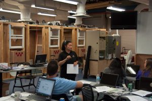 Tei Kucharski teaching a class on weatherization, photo