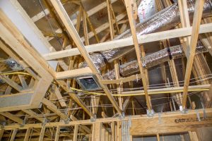 Duct work and a radiant barrier are visible in this photo of a new construction house in Florida.
