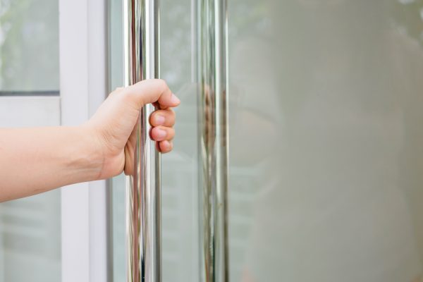 Women hand opening a door photo
