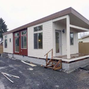 Newly constructed manufactured home with porch, photo.