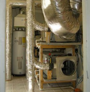 Testing of variable speed heat pump air conditioning system with foil-wrapped ducts.
