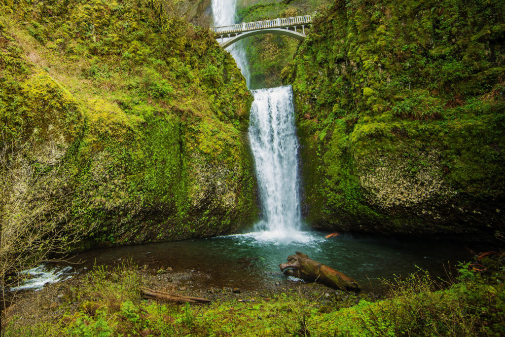 Famous Oregon Multnomah Falls near Portland, Oregon, United States. Waterfalls in Columbia River Gorge Area. Mold grows easily on all surfaces here.